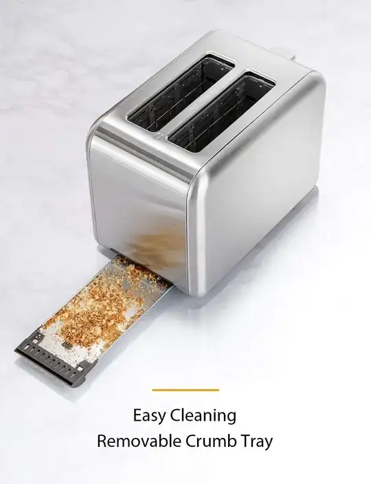 picture of toaster with tray full of crumbs sliding out