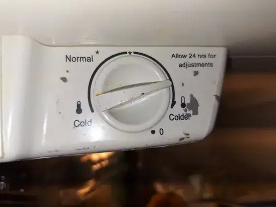 a photograph of a rotary temperature adjustment mechanism for a kenmore brand refrigerator sold in North America prior the the year 2020 and after the year 1960