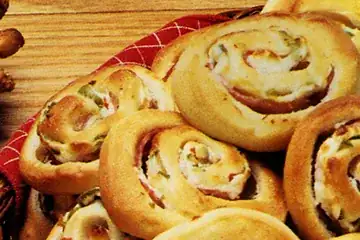 Bread with ham, cheese, and chopped olive swirl