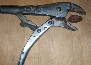 Pit and opened Vise-Grips