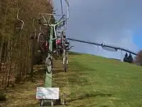 A chairlift with bicycle holders.