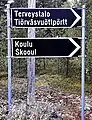 Bilingual sign in Finnish and Skolt Sámi