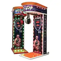 A double boxing arcade machine. Two side-by-side units feature hanging punching bags, digital score displays, and colorful graphics of a boxer. Each unit has bright LED lights outlining the frame and base.