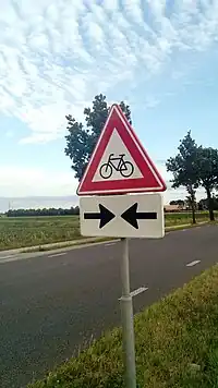 A sign warning of crossing cyclists in the Netherlands. traff_sign=hazard + highway=crossing + hazard=bicycle