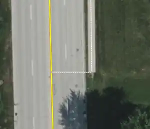 An ending way with footway=sidewalk with a way with footway=link to connect it to the way with highway=secondary