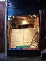 A carpet shop in Turkey that offers to speak with customers in Catalan (ca), Italian (it), and Spanish (es)