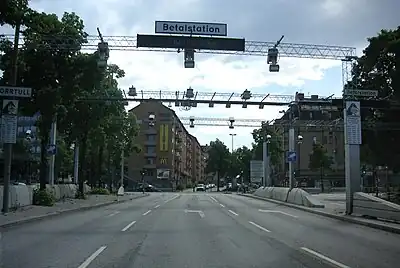 three gantries in Stockholm, Sweden that hold the surveillance cameras for automatic toll-collecting.