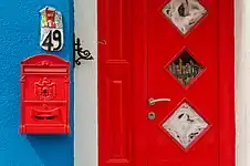 Italy (Venice): amenity=letter_box support=wall_mounted colour=red post:housenumber=49