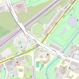 A much less common case where the ramps are justifiably considered to "belong" to the highway with the lower classification – and are tagged accordingly as highway=tertiary_link.