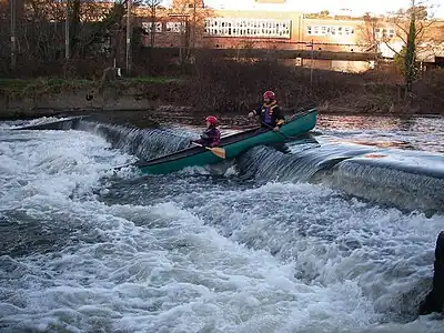 A (non-movable) weir navigated by canoeists