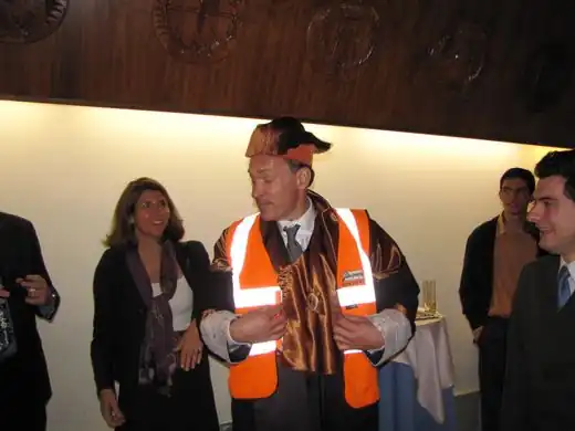 Tim Berners-Lee being presented with an OSM vest