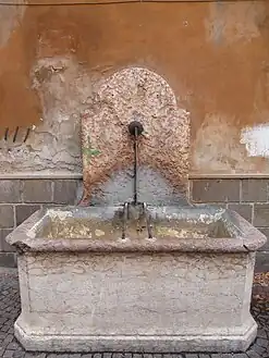 A historical drinking fountain, Trento, Italy