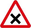 Warning that the upcoming intersection is dangerous: hazard=dangerous_junction