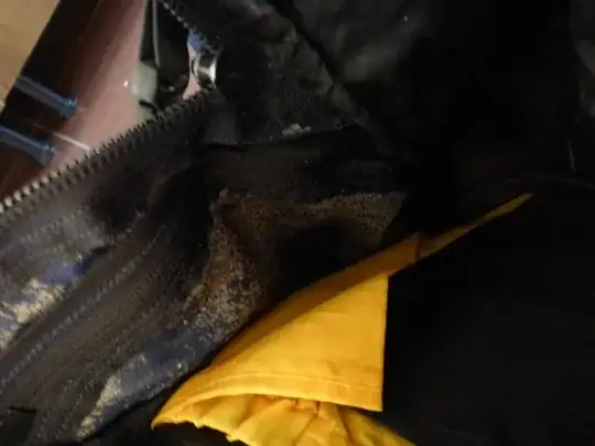 Old backpack inside material peeling off