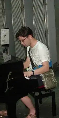 Aaron Hall playing the piano in Vienna