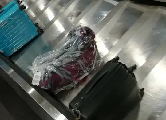 backpack in a plastic bag