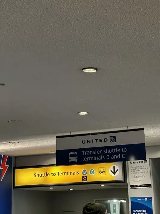 A photo of the Shuttle Transfer signs at Newark