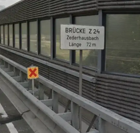 Street View example, red cross on yellow sign