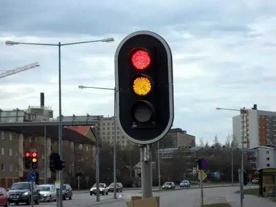 Red-and-yellow traffic signal, location unknown
