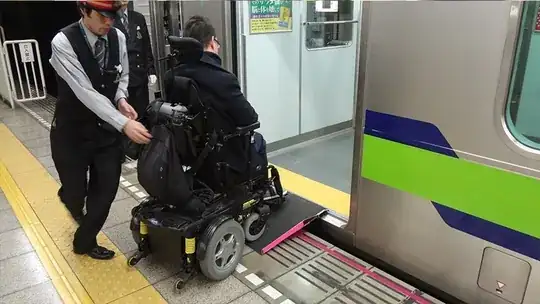 Staff helping using the ramp