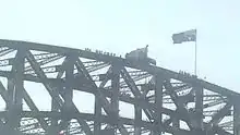 Climbers on the top of the bridge