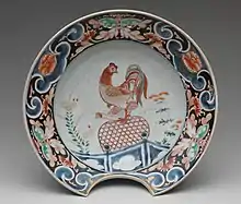 The European shape of a barber's shaving basin bowl, with copulating cock, around 1700