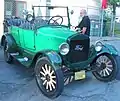 A 1927 Ford T with wood artillery wheels}