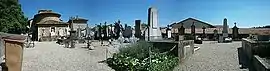 A panoramic view of Saint-Blaise church and cemetery in Saint-Maurice-l'Exil