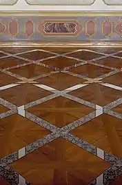 Installation, 2001 Mirror on parquet floor, approx. ca. 800/700/1&nbsp;cm (Museum Ettlingen/ Castle, November 2001)