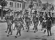 Troops from 'A' Company, 15th Battalion march through Melbourne on 17 December 1914.