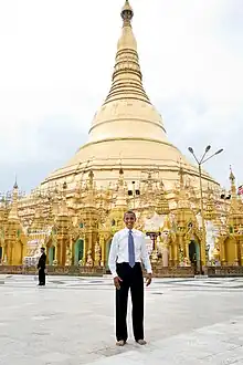 Image 23Former US President Barack Obama poses barefoot on the grounds of Shwedagon Pagoda, one of Myanmar's major Buddhist pilgrimage sites. (from Culture of Myanmar)