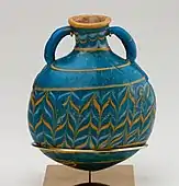Bottle; 1295–1070&nbsp;BC; glass; height: 10&nbsp;cm (4&nbsp;in); Metropolitan Museum of Art