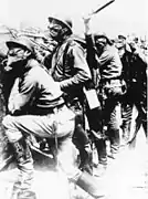 Russian soldiers on the Front of Champagne,Russian uniform and boots, and French helmets and gas masks