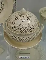 Chestnut basket on dish, attributed to Leeds Pottery, 1780-1800, creamware.  Hot roast chestnuts needed to be able to "breathe".