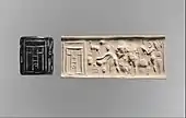 Cylinder seal and impression in which appears a ritual scene before a temple façade; 3500–3100 BC; bituminous limestone; height: 4.5&nbsp;cm; Metropolitan Museum of Art (New York City)