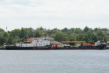 USCGC Mobile Bay, an icebreaking tug based out of Sturgeon Bay, with barge for servicing buoys