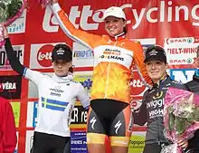 Chantal Blaak (centre), Emma Johansson (left) and Amy Pieters on the podium after the race