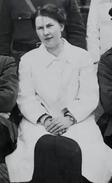 Black and white photograph of Dulcie Mary Pillers, seated front row, next to Ernest William Hey Groves (not shown). Taken from a group photograph of the medical staff at the hospital near the end of World War I.