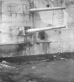 Casemate guns on HMS&nbsp;Kent showing shell damage from the Battle of the Falkland Islands