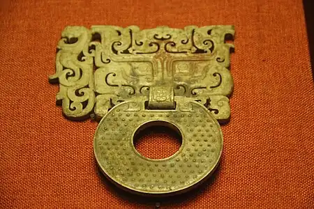 Ornamental handle with a bi disc; c.100 BC; jade; 18 x 14&nbsp;cm; Museum of the Mausoleum of the Nanyue King (Guangzhou, Guangdong, China)