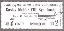 A rectangular card, the main text of which reads "Ausstellung München 1910. Neue Musik-Festhalle. Gustav Mahler VIII. Symphonie, Erste Aufführung, Montag 12. September 1910."