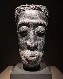 Marble sculpture of head.