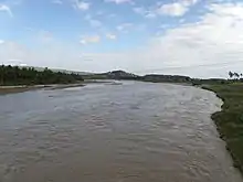 View of the river floodplain during a mid-dry season flood in a La Niña year