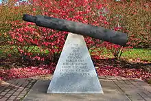 Metal shaft mounted on stone pyramid inscribed "The Dec 6 1917 Halifax Explosion hurled this 1140&nbsp;lb anchor shaft 2.35 miles from the SS Mont Blanc to this park."
