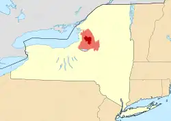 Map of New York State showing the greater Tug Hill region (light red), and its heavily forested "core" region (dark red). Core area based upon The Nature Conservancy's 150,000-acre (610 km2) delineation.