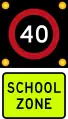 (R1-6) 40&nbsp;km/h school zone speed limit in effect when flashing