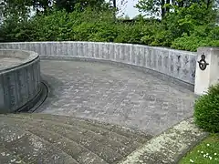 Rear sunken walkway and curved memorial walls
