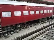A red ICF coach used on an unnamed train