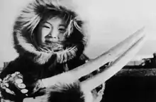 Image 11A Siberian Yupik woman holding walrus tusks (from Indigenous peoples of Siberia)