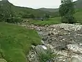 Stream confluence at head of River Doe.